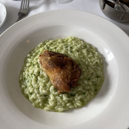 Duck confit over risotto