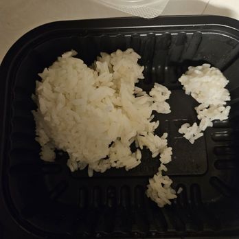 Guava Smoked - Wow Zippy's.   I ordered 2 scoops rice and this is 2nd scoop.  First scoop was good amount but not this.  Damn ripoff - Barbeque Near Me - Honolulu, Hawaii