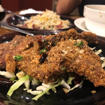 Mr. ChopStix - Salt and pepper pork chops with Chinese sausage fried rice in background - Chinese Near Me - Las Vegas, Nevada Mr. ChopStix - Salt and pepper pork chops with Chinese sausage fried rice in background - Chinese Near Me - Las Vegas, Nevada