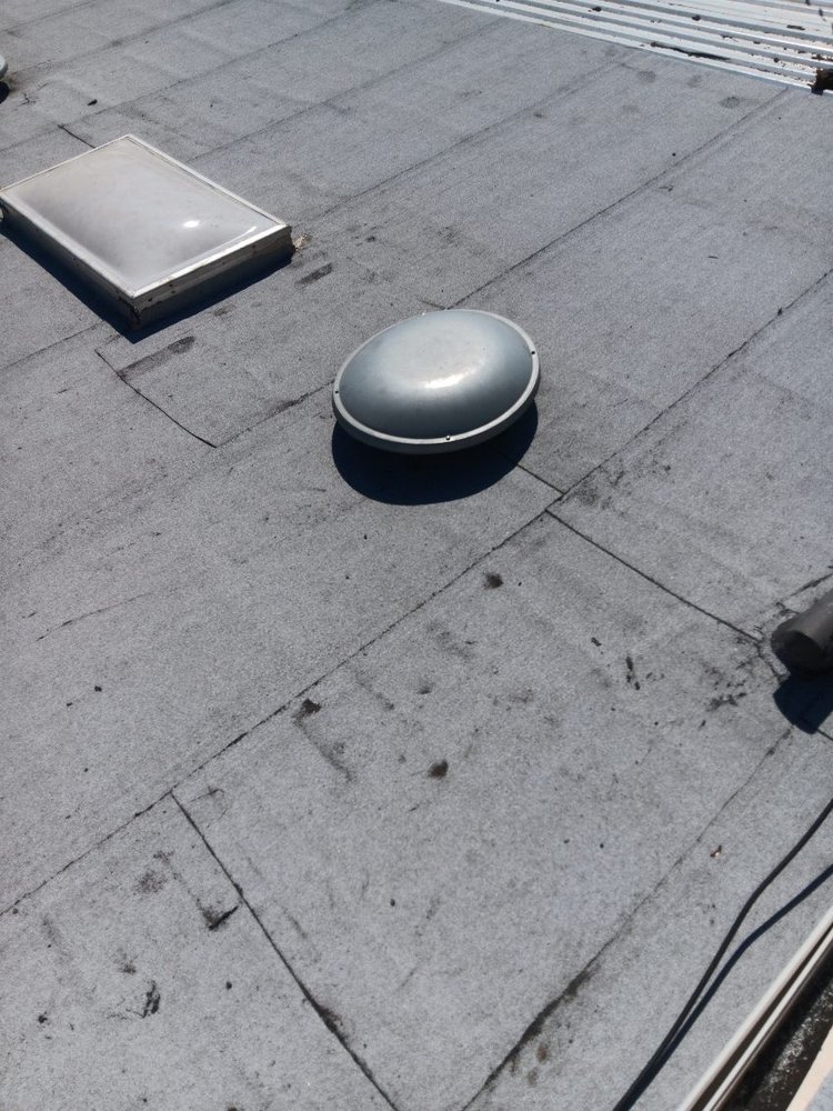 Slide of Off The Roof Roofing