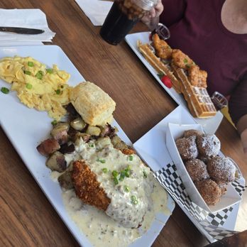 Joe's Farm Grill - Pork tenderloin and eggs. Apple fritters Chicken and waffles - American Near Me - Gilbert, Arizona Joe's Farm Grill - Pork tenderloin and eggs. Apple fritters Chicken and waffles - American Near Me - Gilbert, Arizona