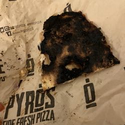 Burnt pizza.