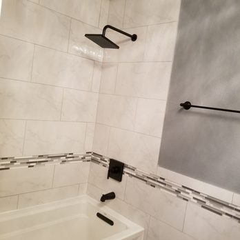 Indigo Carpet & Tile - 12×24 porcelain tiles andx mosaic border - Carpeting Near Me - Mesa, Arizona