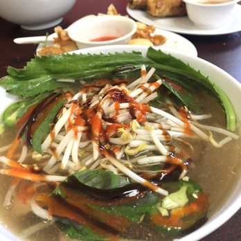 Pho Pasteur VN - Pho tai with cream cheese wontons and egg rolls in the background - Vietnamese Near Me - Saint Paul, Minnesota