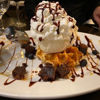 Prime on Whitfield - Dessert waffle, with vanilla Ice cream, whipped cream and brownie bites. - Steakhouses Near Me - Guilford, Connecticut Prime on Whitfield - Dessert waffle, with vanilla Ice cream, whipped cream and brownie bites. - Steakhouses Near Me - Guilford, Connecticut
