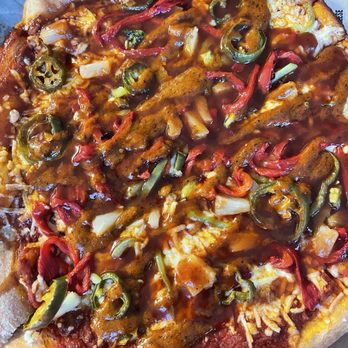 Blaze Pizza - Drowning in "drizzle." All different sized slices; HALF of the pizza isn't even sliced (as you can see in this photo). - Salad Near Me - Torrance, California