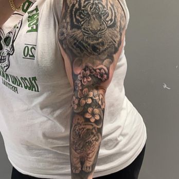 Rosebud Beauty and Ink - Tiger and cherry blossom sleeve - Tattoo Near Me - Greenacres, Florida Rosebud Beauty and Ink - Tiger and cherry blossom sleeve - Tattoo Near Me - Greenacres, Florida