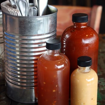 Sweet Cheeks Q - Housemade BBQ sauces: traditional, Carolina vinegar, and habanero. - Southern Near Me - Boston, Massachusetts