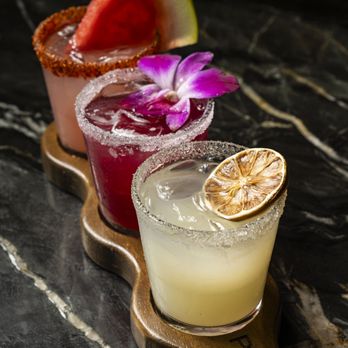 Palenque Kitchen - Margarita Sampler
Enjoy a delicious sampler of our most popular margaritas - sandia pepino, Palenque margarita, hibiscus - Mexican Near Me - Riverside, California Palenque Kitchen - Margarita Sampler
Enjoy a delicious sampler of our most popular margaritas - sandia pepino, Palenque margarita, hibiscus - Mexican Near Me - Riverside, California