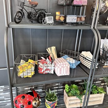 Chick N Roll - a shelf with various items on it - Chicken Wings Near Me - Chesapeake, Virginia