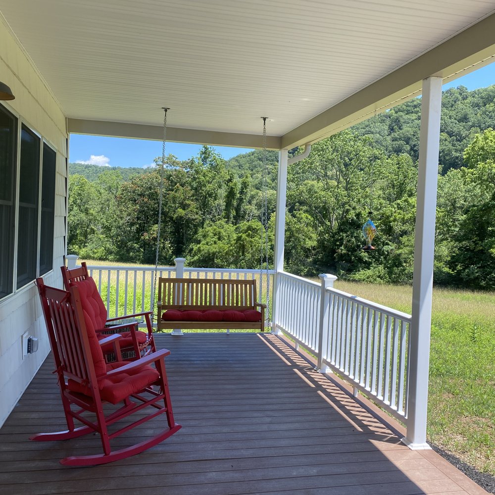 C M Construction and Remodel - a porch with rocking chairs - General Contractors Near Me C M Construction and Remodel - a porch with rocking chairs - General Contractors Near Me