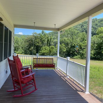 C M Construction and Remodel - a porch with rocking chairs - General Contractors Near Me C M Construction and Remodel - a porch with rocking chairs - General Contractors Near Me