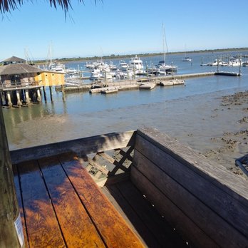 The Conch House Restaurant - One of the outdoor tables on raised platform - Caribbean Near Me - Saint Augustine, Florida