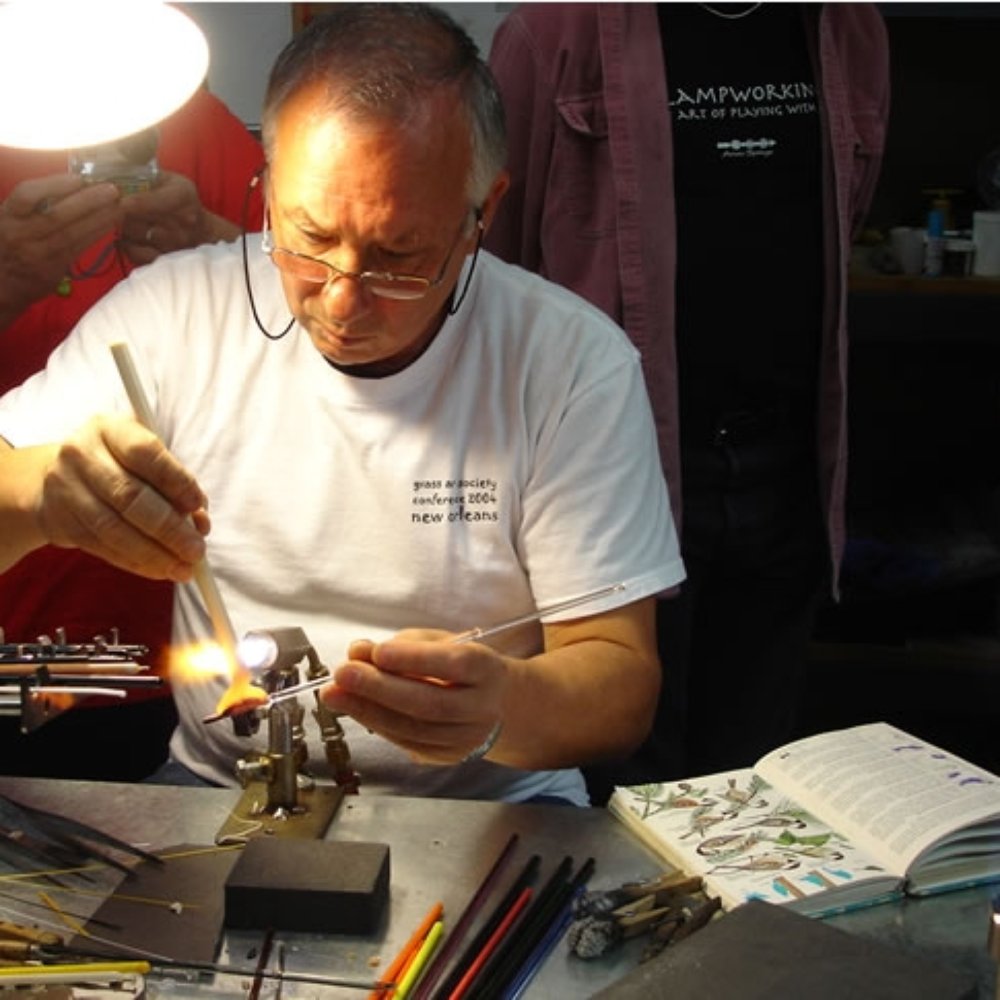 Vittorio Constantini on the torch making a chickadee