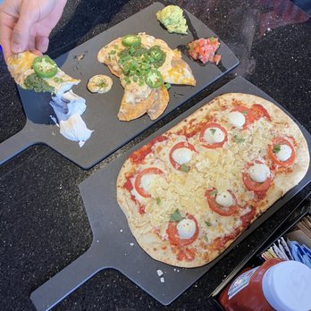 Topgolf - Flatbread ($14), Nachos ($10.5) - Sports Bars Near Me - Renton, Washington Topgolf - Flatbread ($14), Nachos ($10.5) - Sports Bars Near Me - Renton, Washington