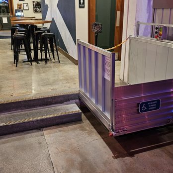 Caledonia Brewing - Mobility handicap lift from main floor to floor where restrooms are. ( as of oct 2025 ) - Breweries Near Me - Dunedin, Florida Caledonia Brewing - Mobility handicap lift from main floor to floor where restrooms are. ( as of oct 2025 ) - Breweries Near Me - Dunedin, Florida