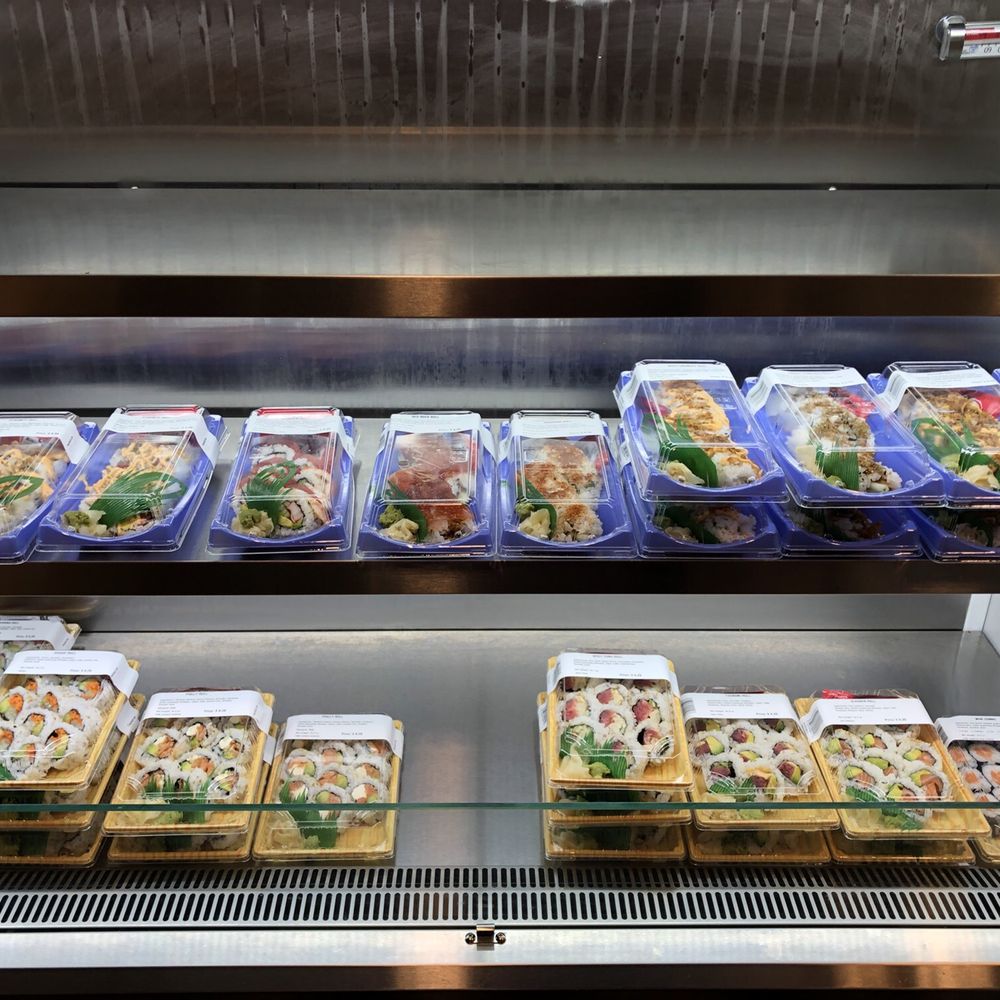 Yoya - a display case filled with different types of food - Sushi Bars Near Me - Baltimore, Maryland