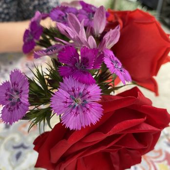 Cafe Degas - a red rose and purple flowers - French Near Me - New Orleans, Louisiana
