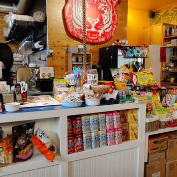 Ultra House - Looking on to the counter with various items for sale as well as the front counter and kitchen. - Ramen Near Me - Langley, Washington Ultra House - Looking on to the counter with various items for sale as well as the front counter and kitchen. - Ramen Near Me - Langley, Washington