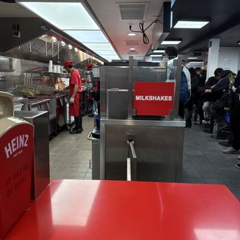 Five Guys - Working hard on orders - Burgers Near Me - New York, New York Five Guys - Working hard on orders - Burgers Near Me - New York, New York