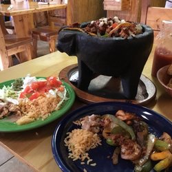 La Hacienda - I don't remember what this was called, but it is like the ultimate fajita! The dish is served in a cast iron pig, steaming hot!