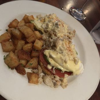 The Majestic Grille - Crab Benedict & country potatoes. - American Near Me - Memphis, Tennessee