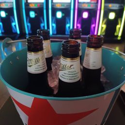 Bucket of Miller Lites and darts to start the night Bucket of Miller Lites and darts to start the night