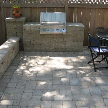 Desmond Landscape - a patio with a grill, table and chairs - Landscaping Near Me - Des Plaines, Illinois Desmond Landscape - a patio with a grill, table and chairs - Landscaping Near Me - Des Plaines, Illinois