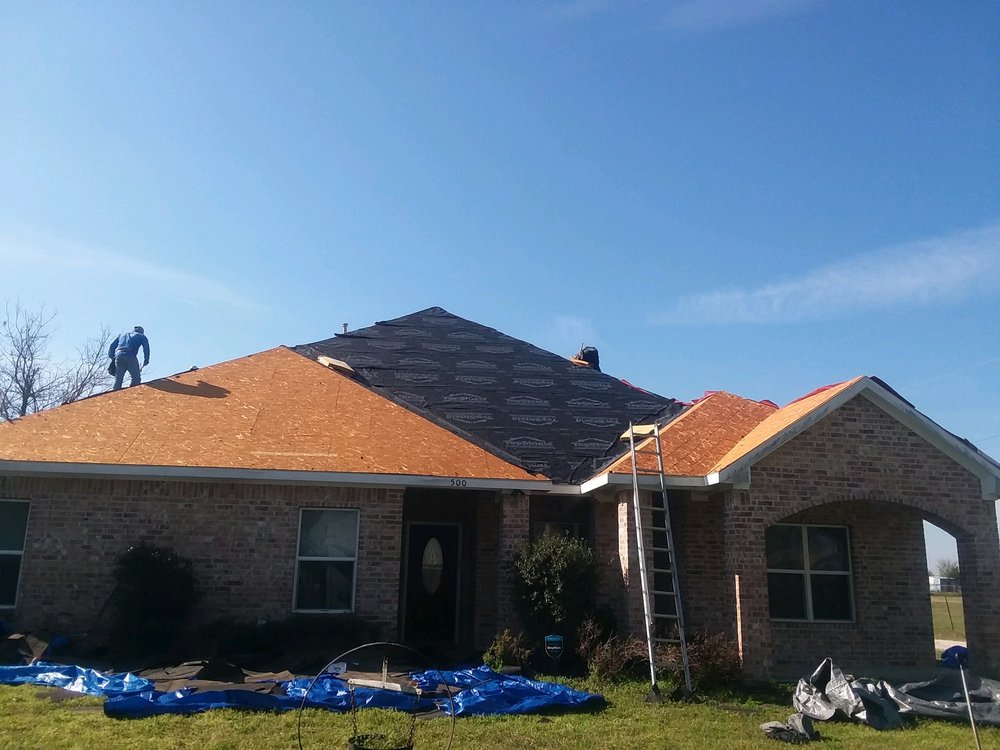 Slide of Rick's Roofing & Construction