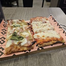 LT- Emiliana-Aged mozz, mortadella, pistachio cream, burrata, basil. $7. Excellent
RT- Plain cheese. Good LT- Emiliana-Aged mozz, mortadella, pistachio cream, burrata, basil. $7. Excellent
RT- Plain cheese. Good