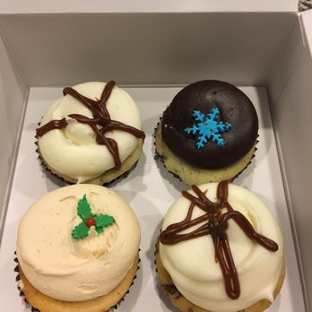 Georgetown Cupcake - L R: Sticky toffee pudding, Santa choc chip & butterscotch cheesecake cupcakes - Bakeries Near Me - Bethesda, Maryland Georgetown Cupcake - L R: Sticky toffee pudding, Santa choc chip & butterscotch cheesecake cupcakes - Bakeries Near Me - Bethesda, Maryland