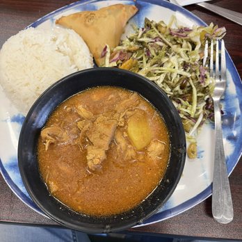 Urban Burma - Chicken curry dinner with tea leaf salad and a samosa. - Burmese Near Me - Aurora, Colorado Urban Burma - Chicken curry dinner with tea leaf salad and a samosa. - Burmese Near Me - Aurora, Colorado