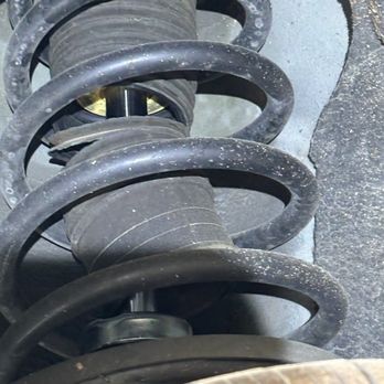 Elite Auto Repair - One of the pictures they sent me of my broken strut/coil - Auto Repair Near Me - Pomona, California Elite Auto Repair - One of the pictures they sent me of my broken strut/coil - Auto Repair Near Me - Pomona, California