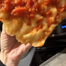 That's not melted cheese that's literally raw dough