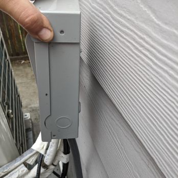 HP Lion Construction - Air conditioning electrical box left unattached to structure - General Contractors Near Me