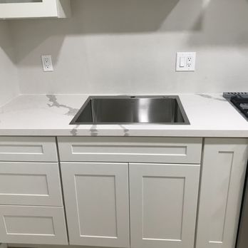 Cutting Edge Granite Marble - a kitchen with a sink and stove - General Contractors Near Me - Santa Cruz, California Cutting Edge Granite Marble - a kitchen with a sink and stove - General Contractors Near Me - Santa Cruz, California