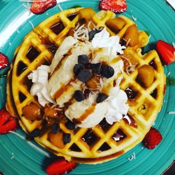 Shway Shway Cafe - Lemon Waffles- Slightly crispy outside, soft in the middle, topped w/our signature maple mint butter,whipped coconut cream & seasonal fruit. - Cafes Near Me - Windsor, Ontario Shway Shway Cafe - Lemon Waffles- Slightly crispy outside, soft in the middle, topped w/our signature maple mint butter,whipped coconut cream & seasonal fruit. - Cafes Near Me - Windsor, Ontario