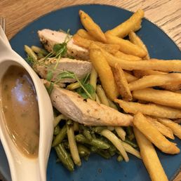 Chicken with Chanterelle mushroom sauce. They kindly subbed in fries instead of potato dumplings. Chicken with Chanterelle mushroom sauce. They kindly subbed in fries instead of potato dumplings.
