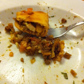Jumbo Empanadas - This is the last bite. I don't think you can give a better compliment without actually licking the plate. - Latin American Near Me - Toronto, Ontario