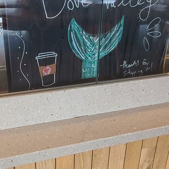 Starbucks - a coffee shop window with a sign on it - Coffee & Tea Near Me - Phoenix, Arizona Starbucks - a coffee shop window with a sign on it - Coffee & Tea Near Me - Phoenix, Arizona