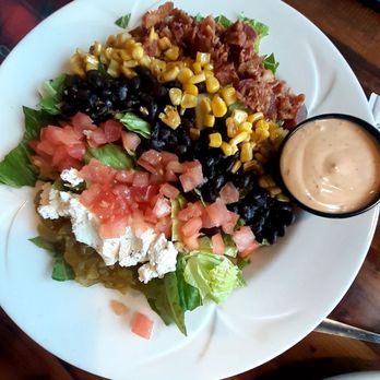 The Happy Troll Deli & Pub - Phoenix Salad. Chipotle bacon rach dressing, bacon, corn, black beans, tomatoes, goat cheese, and green chili. Excellent. - Delis Near Me - Charlevoix, Michigan The Happy Troll Deli & Pub - Phoenix Salad. Chipotle bacon rach dressing, bacon, corn, black beans, tomatoes, goat cheese, and green chili. Excellent. - Delis Near Me - Charlevoix, Michigan