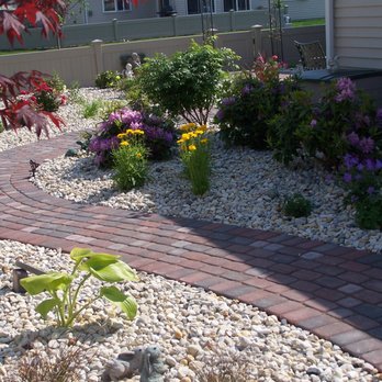 Star Landscaping - Brick Paver Walkway with decorative rock and plants. - Snow Removal Near Me - Dyer, Indiana