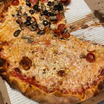Sebbys Pizzeria - Half cheese, half pepperoni, mushrooms, and black olives - Wine Bars Near Me - Southport, North Carolina