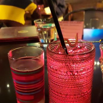 John Brown Underground - a glass of water and a straw in a restaurant - Cocktail Bars Near Me - Lawrence, Kansas