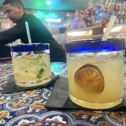 Jalapeño cucumber margarita and a pineapple margarita. Jalapeño cucumber margarita and a pineapple margarita.