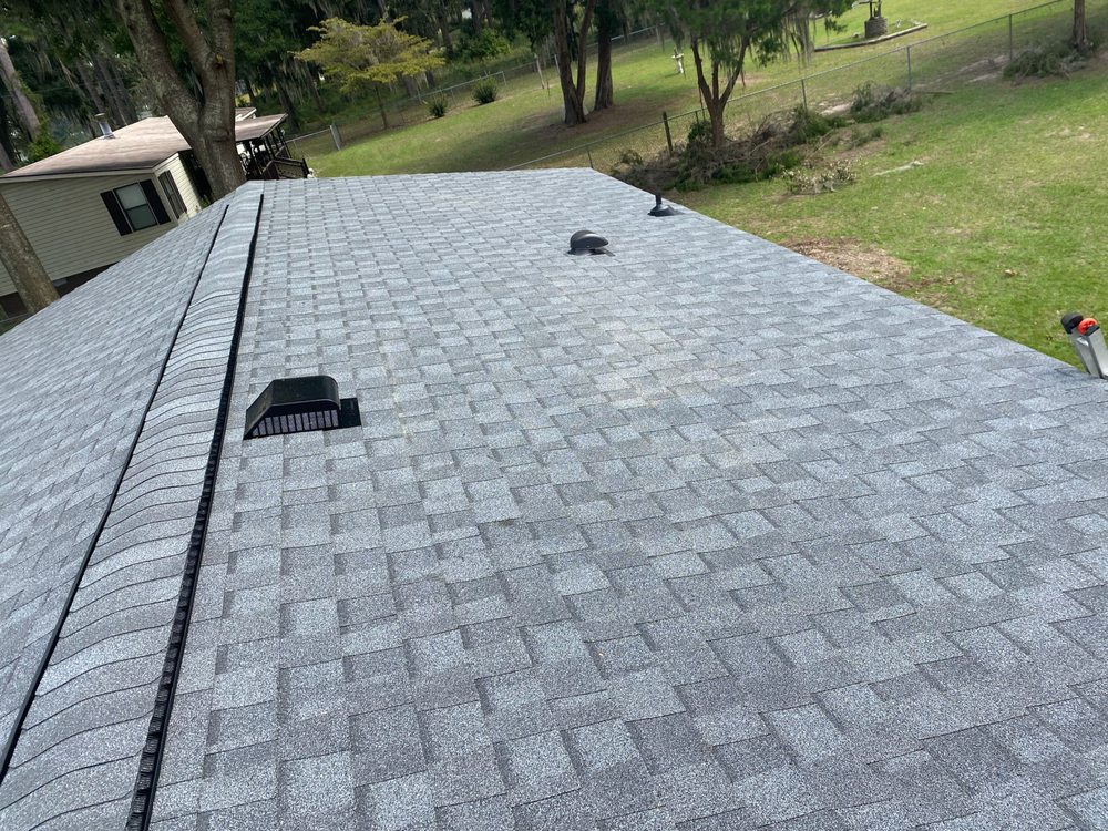 Slide of Precision Roofing
