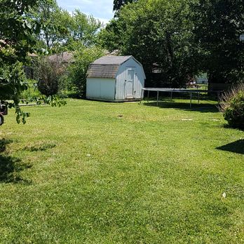 Here to Help Lawn Mowing - a lawn mower and a shed - Landscaping Near Me - Springfield, Missouri