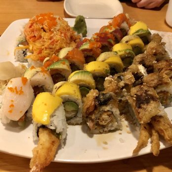 Ronin Sushi and Bar - From top left to bottom right: volcano roll, Hawaiian Roll, mango with tempura shrimp and the sea monster roll. - Sushi Bars Near Me - Daytona Beach, Florida