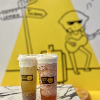 Happy Lemon - two drinks sitting on a table - Bubble Tea Near Me - Tacoma, Washington Happy Lemon - two drinks sitting on a table - Bubble Tea Near Me - Tacoma, Washington