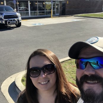 Waffle House - a man and a woman standing in front of a waffle house - Breakfast & Brunch Near Me - Bristol, Tennessee